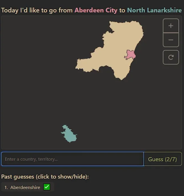 Travle gameplay: aberdeenshire is yellow between pink Aberdeen City and teal North Lanarkshire, while the remaining Scottish council areas are hidden.